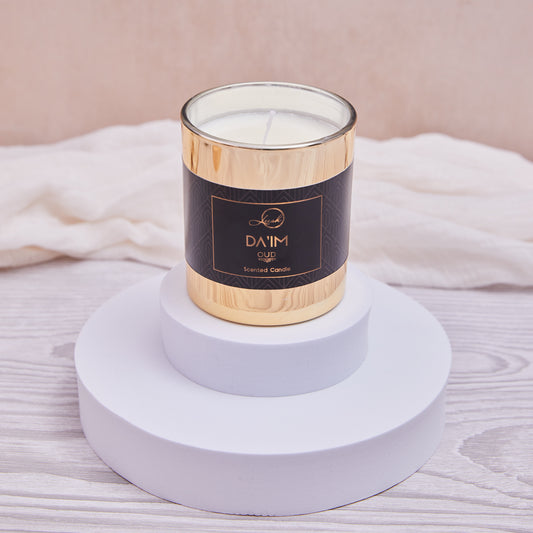 Da’im Oud Candle in elegant packaging, a luxurious home fragrance with oud, saffron, and sandalwood for a warm and exotic atmosphere