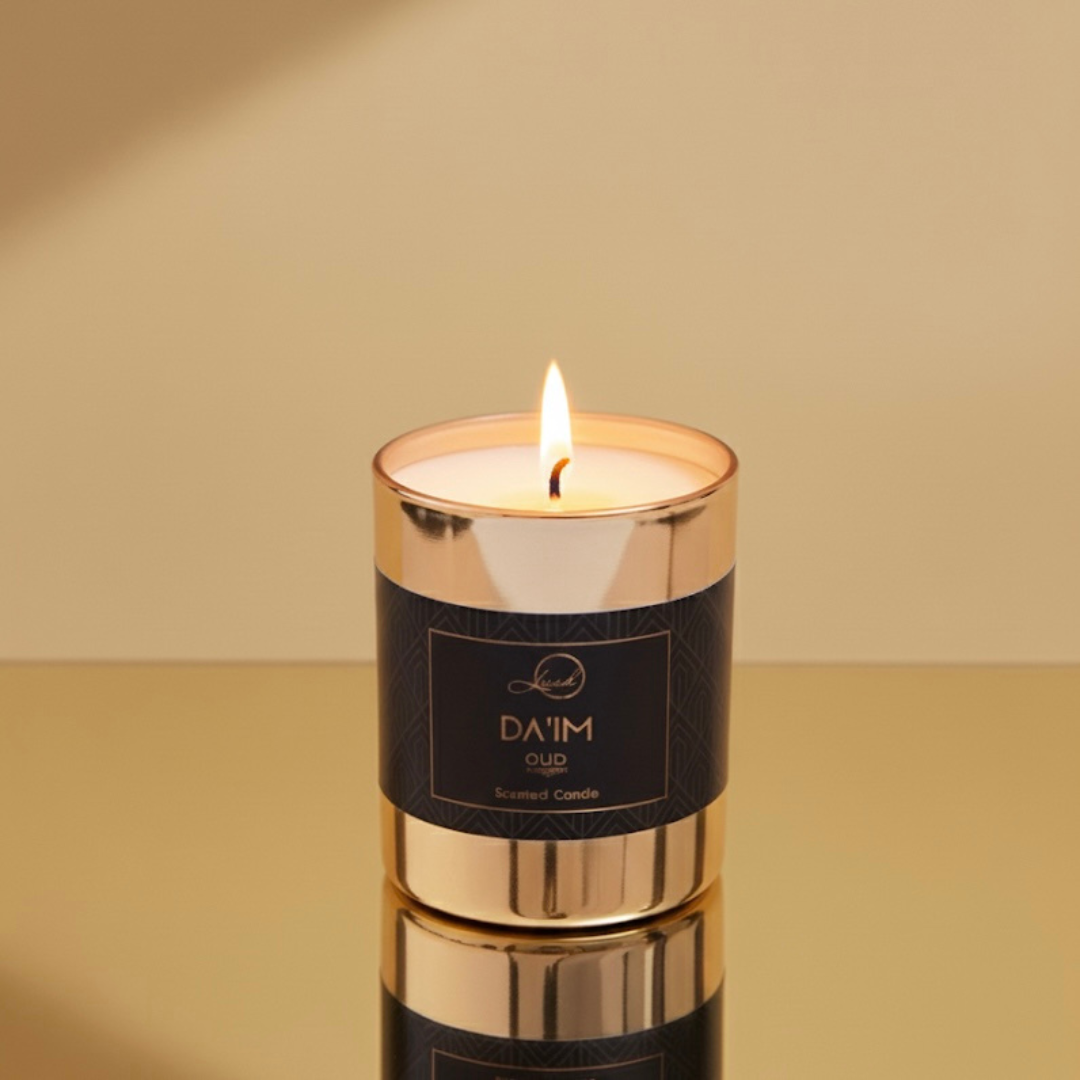 Da’im Oud Candle by Leesh Fragrances — a warm, amber-lit luxury candle with oud, jasmine, and vanilla notes, evoking intimacy and elegance.
